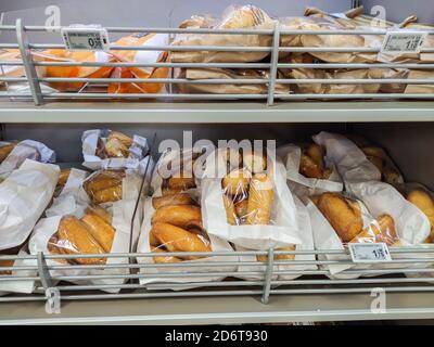 Puilboreau, France - October 14, 2020:Multitude of mini breads in the bakery section of a supermarket Stock Photo