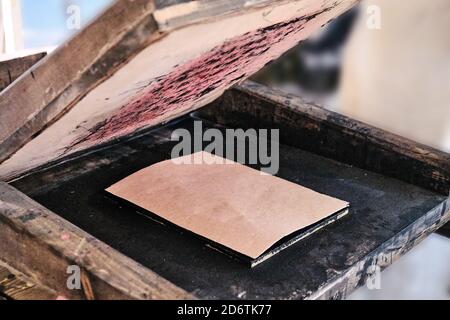 Wooden retro typography mechanism for printing. Print sheets of books in a vintage way. Retro printing press. Stock Photo