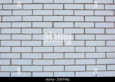 White grunge brick wall isolated texture background. Stock Photo