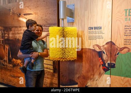 Tillamook, Oregon, USA - June 28, 2018: Dad and his son visiting the Museum at the Tillamook Cheese Factory in Tillamook, OR, USA Stock Photo