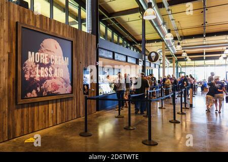 Tillamook, Oregon, USA - June 28, 2019: Visitors line at the ice cream cafe in the Tillamook Creamery, a visitor center at the Tillamook Cheese Factor Stock Photo