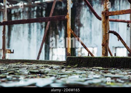 metal railing with deteriorated floor and miscellaneous moss Stock Photo