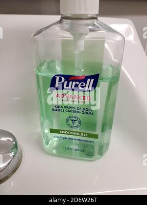 Close-up of green colored Purell brand hand sanitizer on white bathroom surface, Lafayette, California, September 24, 2020. () Stock Photo