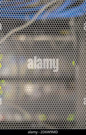 Lattice with bokeh background from led light of lamps and cables, copy space Stock Photo