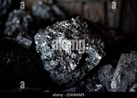 Coal industry. Chunks of black coal close-up. Stock Photo