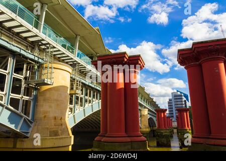 View of Blackfriars Railway Bridge and remains of the old demolished bridge, viewed from the north bank of the Thames River,London,United Kingdom Stock Photo