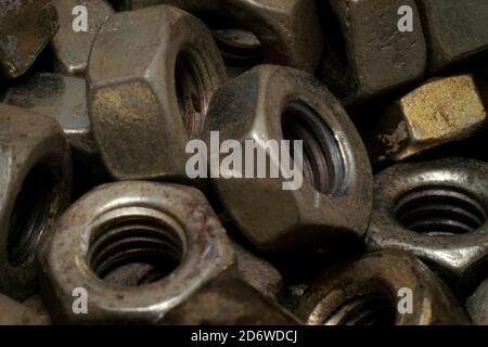 Macro shot stacked of dusty nuts in the workshop Stock Photo