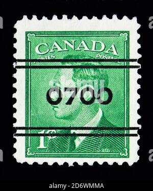 MOSCOW, RUSSIA - MAY 13, 2018: A stamp printed in Canada shows King George VI, from photographs by Dorothy Wilding, King George VI: 1949-51 Definitive Stock Photo