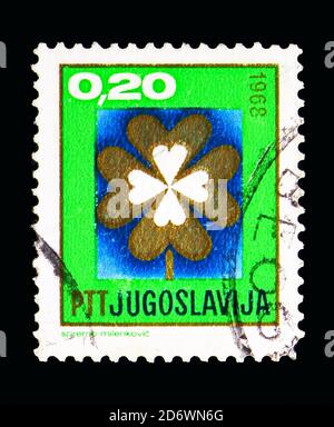 MOSCOW, RUSSIA - MAY 13, 2018: A stamp printed in Yugoslavia shows Lucky Clover, New Year 1968 serie, circa 1967 Stock Photo