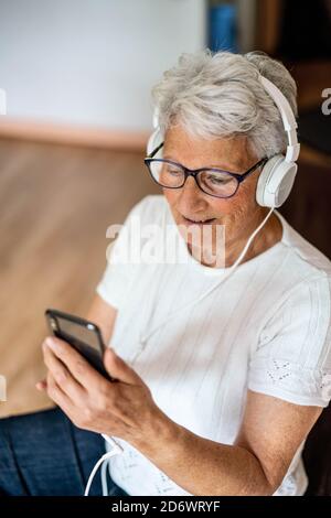 Woman using a smartphone. Stock Photo