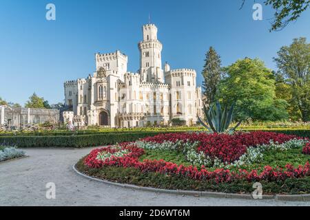 Beautiful renaissance castle Hluboka in the Czech Republic is located in south bohemia. Summer wether with blue sky and rose gardens Stock Photo