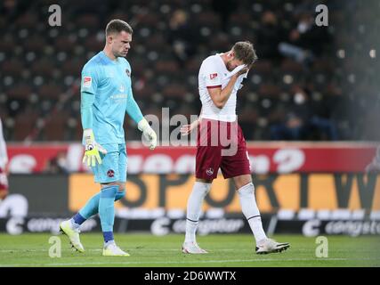 Hamburg, Germany. 19th Oct, 2020. Football: 2nd Bundesliga, 4th matchday, FC St. Pauli - 1st FC Nürnberg, at the Millerntor stadium. Nuremberg goalkeeper Christian Mathenia (l) and Asger Soerensen. Credit: Selim Sudheimer/dpa - IMPORTANT NOTE: In accordance with the regulations of the DFL Deutsche Fußball Liga and the DFB Deutscher Fußball-Bund, it is prohibited to exploit or have exploited in the stadium and/or from the game taken photographs in the form of sequence images and/or video-like photo series./dpa/Alamy Live News Stock Photo