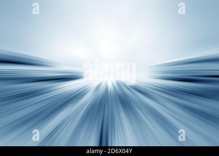 Streaks of light on road. Abstract background of light lines. Perspective of luminous stripes. Stock Photo