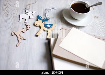 A porcelain cup with coffee on a long empty table. Space for text. Stock Photo