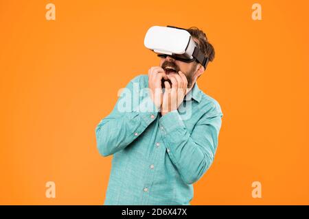 Augmented reality. Game development. Digital technology. Living alternative life. Hipster play video game. Impressive visual effects. Bearded man explore vr. Gamer concept. Gaming hobby. Cyber sport. Stock Photo