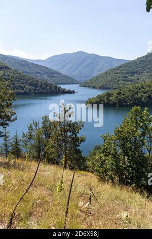Summer ladscape of Vacha (Antonivanovtsi) Reservoir, Rhodope Mountains, Plovdiv Region, Bulgaria Stock Photo
