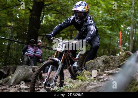 Aaron Gwin of USA is seen in action during the Qualifying round at the UCI Mountain Bike World Cup in Maribor. Stock Photo