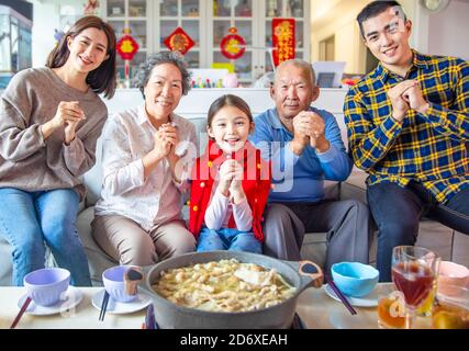 happy asian family having dinner and celebrating chinese new year at home Stock Photo