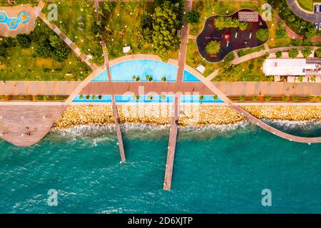 Aerial view of Molos Promenade park of Limassol, Cyprus with beachfront walk path and palm trees Stock Photo