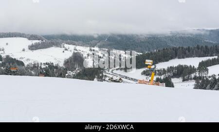 Panoramic winter view of Beskid Sadecki mountains from ski slope in Krynica Zdroj, Poland Stock Photo