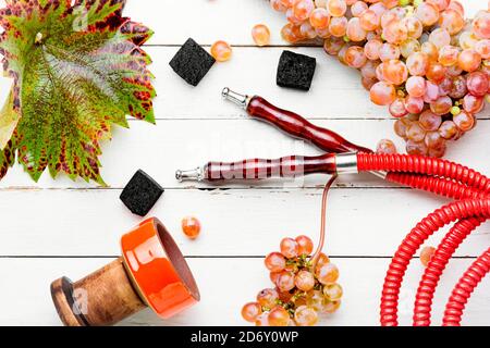 Hookah with grape tobacco.Fragrant grape shisha on white background Stock Photo
