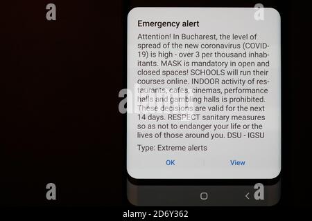 Bucharest, Romania - October 20, 2020: Details with a RO ALERT message received by all the inhabitants of Bucharest regarding the spread of the Covid- Stock Photo