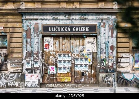 Prague, Czech republic - August 31, 2019. Door with old wallpapers with the main board Ulicnicka galerie in Holesovice Stock Photo