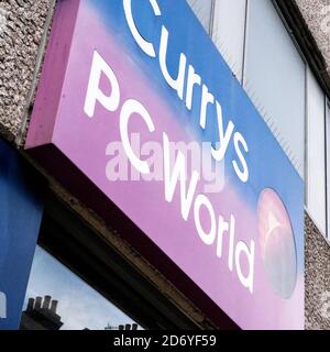 London UK October 19 2020, Currys PC World Logo High Street Shop Sign Stock Photo