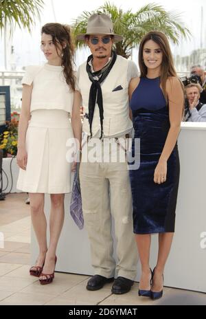 Astrid Berges-Frisbey, Johnny Depp and Penelope Cruz pictured at a photocall for Pirates of the Caribbean 4: On Stranger Tides, during the 64th Cannes International Film Festival, at the Palais des Festivales in Cannes, France. Stock Photo