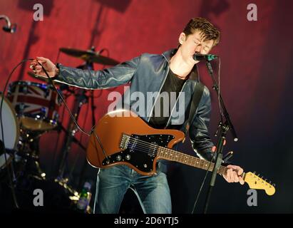 SINGLE EDITORIAL USE ONLY WITHIN 3 MONTHS OF TRANSMISSION DATE / NO ARCHIVING Alex Turner from Arctic Monkeys performing at the V festival in Chelmsford, Essex. Stock Photo