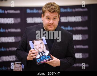 James Corden signs copies of his new book, May I Have Your Attention Please, at Selfridge's department store in central London. Stock Photo