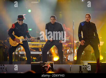 (l-r) Jackie, Tito and Marlon Jackson of the Jacksons performing on stage at the Michael Forever Michael Jackson tribute concert, held at the Millennium Stadium in Cardiff, Wales. Stock Photo