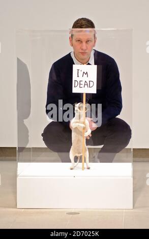 Artist David Shrigley pictured with his work I'm Dead, at
