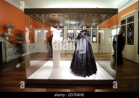 Dresses worn by Princess Diana, including a black Emanuel evening gown, on display in Kensington Palace. The public galleries re-open on 26th March 2012. Stock Photo