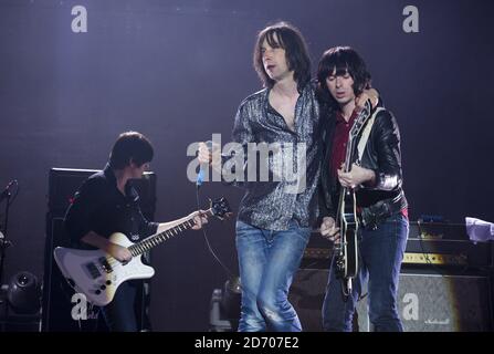 New bass player Debbie Googe, Bobby Gillespie and guitarist Andrew Innes performing with Primal Scream, on the eve of the Isle of Wight festival, at Seaclose Park. Stock Photo