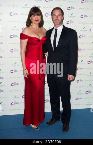 Amanda Lamb and guest attending the Emeralds and Ivy Ball, in aid of Cancer Research UK, at Supernova in Embankment Gardens, London. Stock Photo