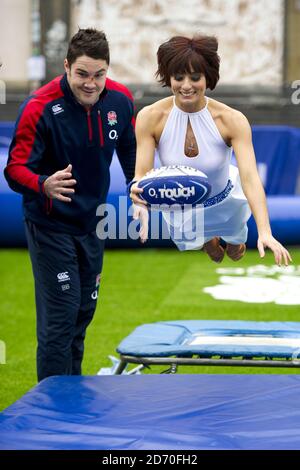 Flavia Cacace pictured with England rugby players Mike Brawn, Brad Barritt and Alex Goode at the launch of the RFU and O2 National Touch Rugby Tour, at the Truman Brewery in east London. The tour aims to promote the non-contact sport across England. Stock Photo