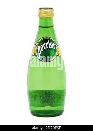 BUCHAREST, ROMANIA - AUGUST 13, 2015. Bottle of Perrier Sparkling Natural Mineral Water, fortified with gas from the spring Stock Photo