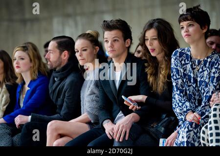 Michael Polish, Kate Bosworth, Louis Tomlinson, Eleanor Calder, Pixie Geldof and Daisy Lowe on the front row at Top Shop Unique, during the autumn/ winter 2013 catwalk show as part of London Fashion Week at Tate Modern, London. Stock Photo