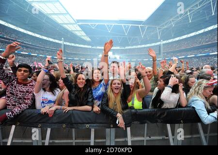 Fans during Capital FM's Summertime Ball at Wembley Stadium, London. Stock Photo