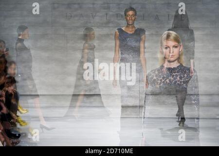 EDITORS NOTE - THIS IMAGE WAS CREATED USING IN-CAMERA MULTIPLE EXPOSURE FEATURE. Models on the catwalk at the David Tlale fashion show, held at the Lincoln Centre in New York, as part of Mercedes Benz New York Fashion Week F/W 2014. Stock Photo