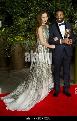 Chiwetel Ejiofor and Sari Mercer arriving at the EE British Academy Film Awards After Party, held at the Grosvenor Hotel in centralLondon Stock Photo