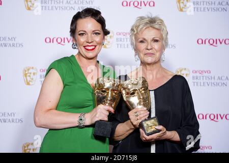 Julie Walters with the Academy Fellowship Award, alongside Olivia Colman (left) with the Leading Actress Award for Broadchurch, at the 2014 Arqiva British Academy Television Awards at the Theatre Royal, Drury Lane, London. Stock Photo