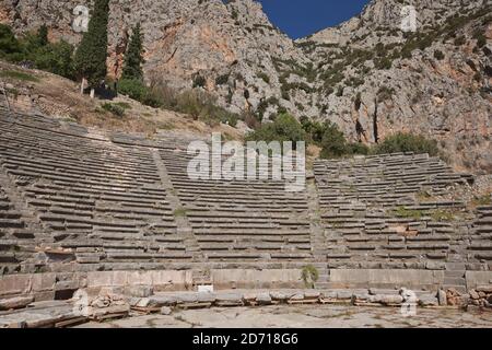 Panoramic view of Ancient Theater of Delphi, Phocis in Greece. The theater, with a total capacity of 5,000 spectators, is located at the sanctuary of Stock Photo