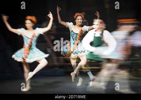 EDITORS NOTE: This image was shot using in-camera multiple exposure. Dancers performing with the English National Ballet, during a rehearsal for Coppelia, at the Coliseum theatre in London.  Stock Photo