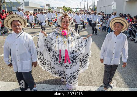 Miami Florida,Little Havana,Hispanic Calle Ocho,Tres Reyes Magos Three 3 Kings parade,costumes outfits boy boys woman female parading, Stock Photo