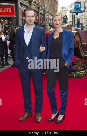 Rafe Spall and Elize du Toit attending the premiere of Get Santa, at the Vue cinema in Leixester Square, London Stock Photo