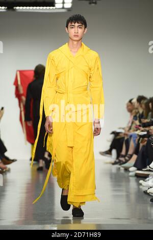 A model on the catwalk during the Craig Green fashion show during the British Fashion Council's London Collections: Men at Victoria House in London. Stock Photo