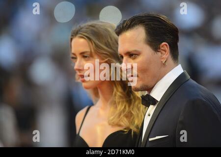 Johnny Depp and Amber Heard attending the Black Mass Premiere, at the 72nd Venice Film Festival in Venice, Italy. Stock Photo