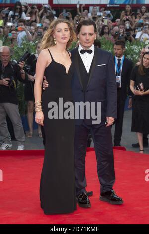 Johnny Depp and Amber Heard attending the Black Mass Premiere, at the 72nd Venice Film Festival in Venice, Italy. Stock Photo